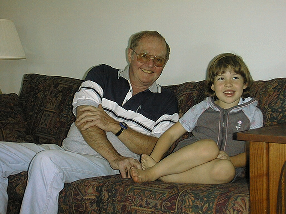 Tickling his grandaughter, 1999